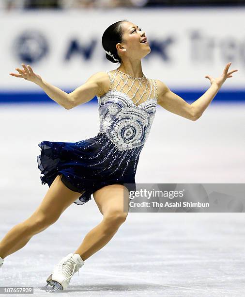 Akiko Suzuki of Japan competes in the Ladies' Free Program during day two of the ISU Grand Prix of Figure Skating 2013/2014 NHK Trophy at Yoyogi...