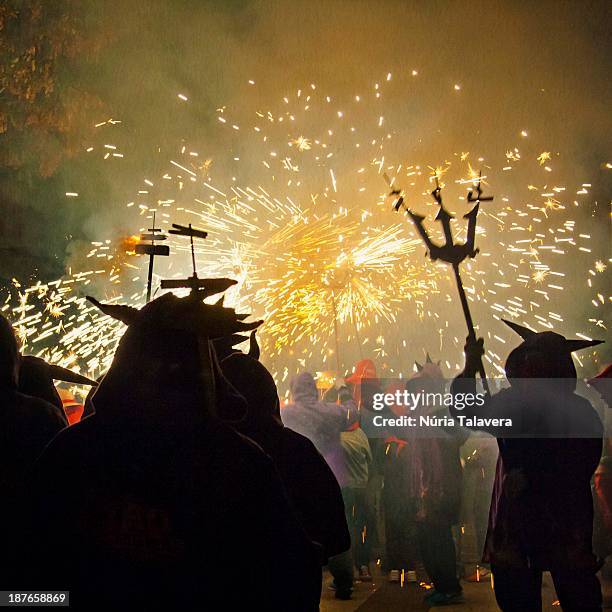 dance of devils in the correfoc - correfoc stock pictures, royalty-free photos & images