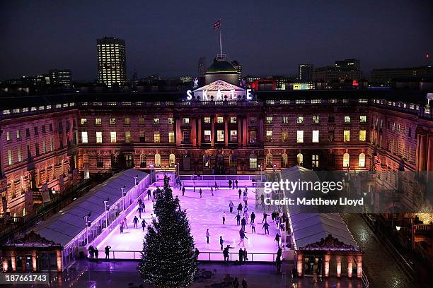 Skaters take to the ice at the Somerset House annual ice skating rink on November 11, 2013 in London, England. Set in Somerset Houses 18th century...