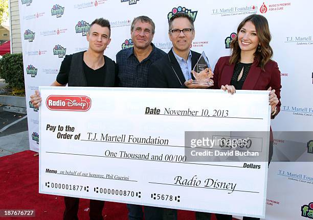 Of Ketchum Sounds and Family day Chairman Marcus Peterzell and The Vice President of Programming and General Manager of Radio Disney Phil Guerini...