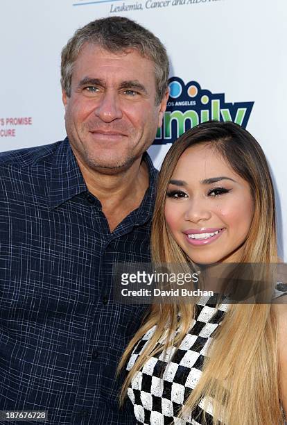 Of Ketchum Sounds and Family Day Chairman Marcus Peterzell and Singer Jessica Sanchez attends The T.J. Martell Foundation's Family Day LA at CBS...