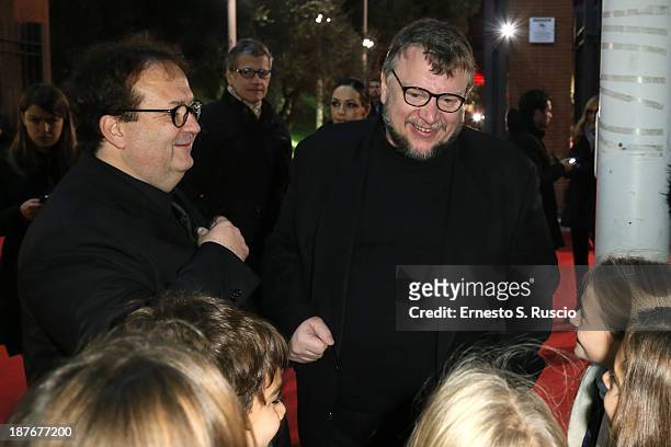 Directors Carlo Carlei and Guillermo Del Toro talks with fans as they attend 'Romeo And Juliet' Premiere during The 8th Rome Film Festival at...