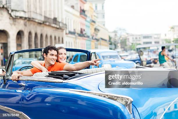 tourist driving by the city - havana city stock pictures, royalty-free photos & images