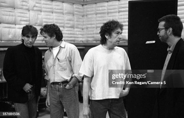 Musicians Bob Dylan and Eric Clapton are photographed behind the scenes of Bob Dylan's 30th Anniversay Concert on October 16, 1992 in New York City....