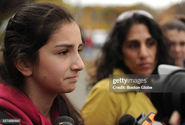 Accompanied by her mother, Danvers High School student Emily Nestor talked to members of the media across the school on October 25 the first day...