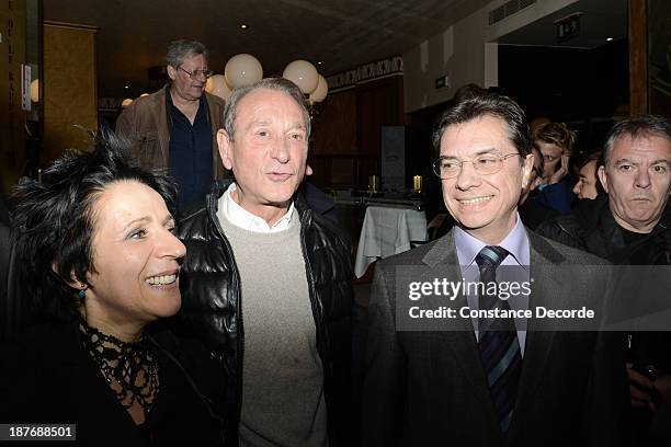 Betrand Delanoe, posing with Michel Bessiere and Marie_Rose Guarnieri at the Prix Wepler 2013 Literary Prize award announcement on November 11, 2013...