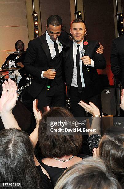 Marvin Humes and Gary Barlow attend the BBC Children in Need Gala hosted by Gary Barlow at The Grosvenor House Hotel on November 11, 2013 in London,...