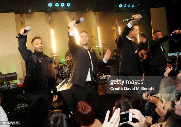 Aston Merrygold, Gary Barlow, Marvin Humes and Jonathan 'JB' Gill perform at the BBC Children in Need Gala hosted by Gary Barlow at The Grosvenor...