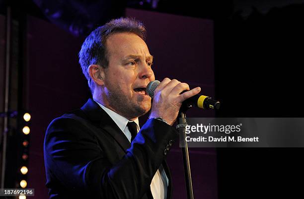 Jason Donovan performs at the BBC Children in Need Gala hosted by Gary Barlow at The Grosvenor House Hotel on November 11, 2013 in London, England.