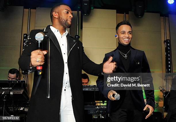 Oritse Williams and Aston Merrygold attend the BBC Children in Need Gala hosted by Gary Barlow at The Grosvenor House Hotel on November 11, 2013 in...