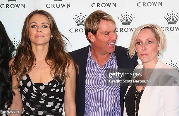 Shane Warne and Elizabeth Hurley pose with Fifi Box as they attend the launch of the Shane Warne Foundation's Ambassador Program at Club 23 on...