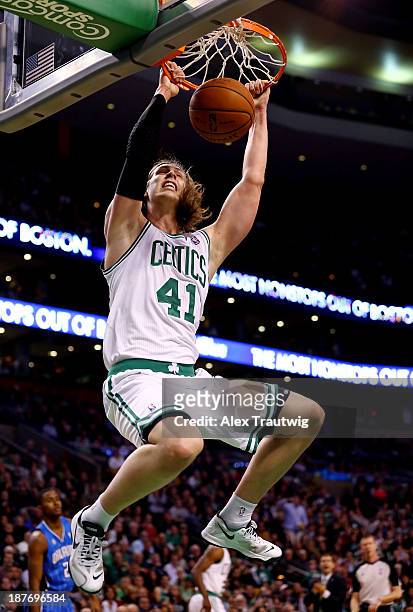 Kelly Olynyk of the Boston Celtics dunks against the Orlando Magic during a game at the TD Garden on November 11, 2013 in Boston, Massachusetts. NOTE...