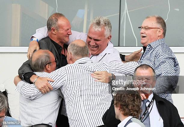 The owners of Sundown In Paris that won the Cromwell Lake Dunstan Handicap Trot race celebrate during New Zealand Trotting Cup Day at Addington...