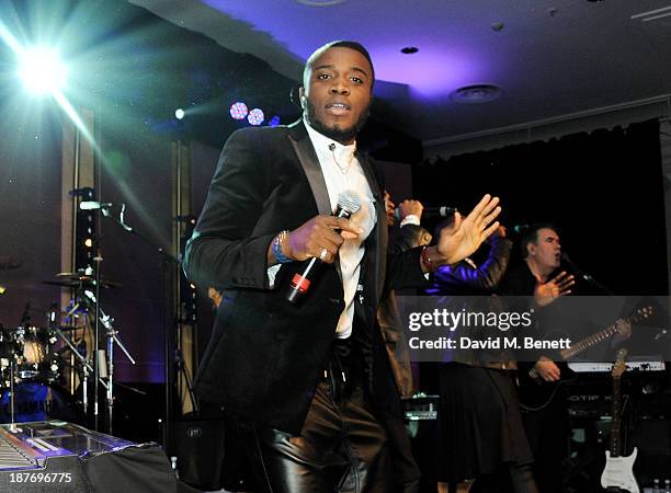 Joseph Ramsay of Rough Copy performs at the BBC Children in Need Gala hosted by Gary Barlow at The Grosvenor House Hotel on November 11, 2013 in...