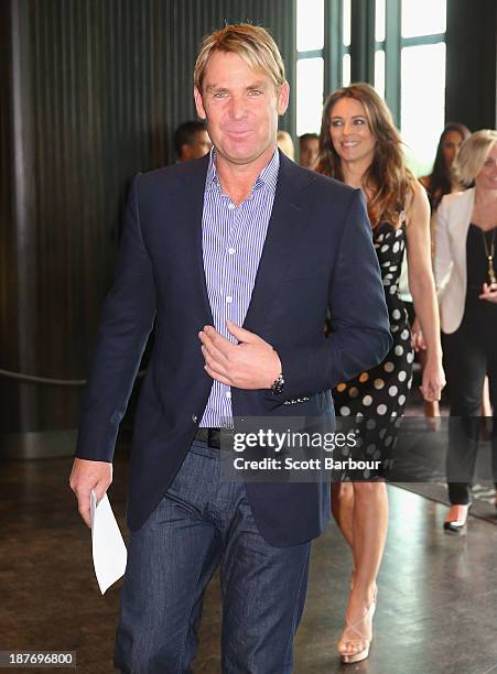 Shane Warne and Elizabeth Hurley arrive to attend the launch of the Shane Warne Foundation's Ambassador Program at Club 23 on November 12, 2013 in...