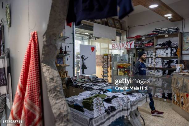 Banksy store stands empty on December 23, 2023 in Bethlehem, West Bank. Last month, Christian Palestinian leaders here called off public Christmas...