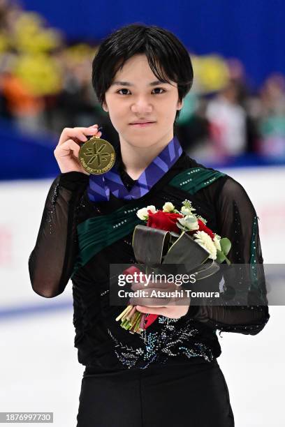 Shoma Uno of Japan poses with gold medal during day three of the 92nd All Japan Figure Skating Championships at Wakasato Multipurpose Sports Arena on...