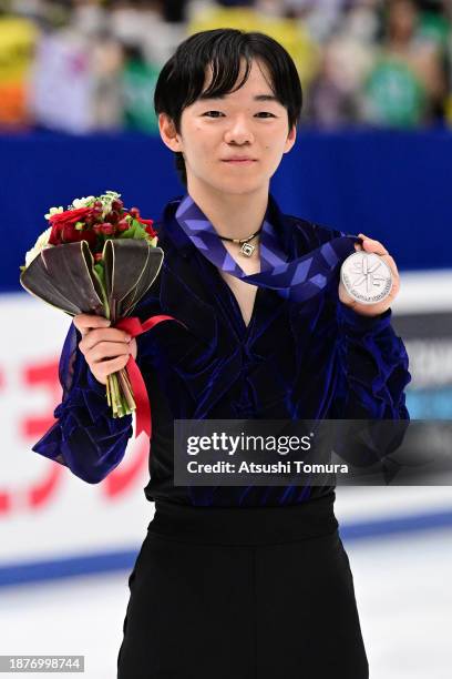 Yuma Kagiyama poses with silver medal during day three of the 92nd All Japan Figure Skating Championships at Wakasato Multipurpose Sports Arena on...