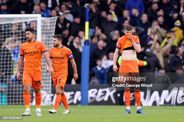 Massimo Luongo, Sam Morsy and Cameron Burgess of Ipswich Town look dejected after Pascal Struijk of Leeds United scores their team's first goal...