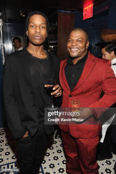 Rapper ASAP Rocky and artist Kehinde Wiley attend the GQ Men of the Year dinner on November 11, 2013 in New York City.