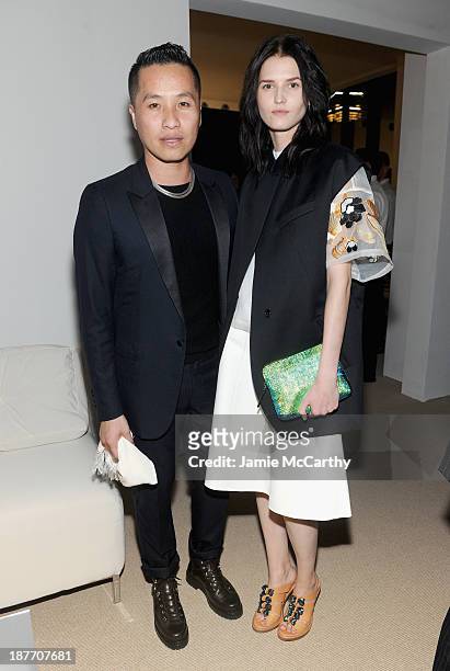 Designer Phillip Lim and model Katlin Aas attend CFDA and Vogue 2013 Fashion Fund Finalists Celebration at Spring Studios on November 11, 2013 in New...