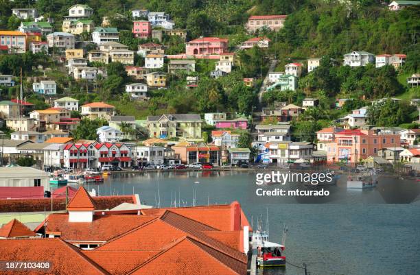 st. george's inner harbour and building on the hill side, saint george's, grenada - st george's harbour stock pictures, royalty-free photos & images