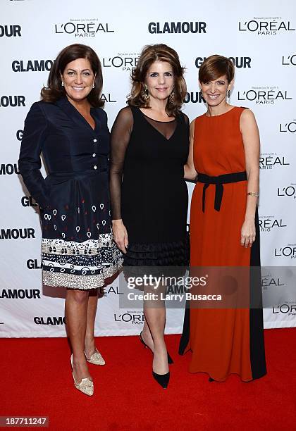 Vice president and publisher at Glamour Connie Anne Phillips, L'Oreal Paris President Karen Fondu, and Glamour Editor-in-Chief Cindi Leive attend...