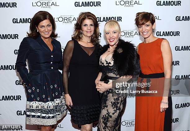 Vice president and publisher at Glamour Connie Anne Phillips, L'Oreal Paris President Karen Fondu, production designer Catherine Martin, and Glamour...