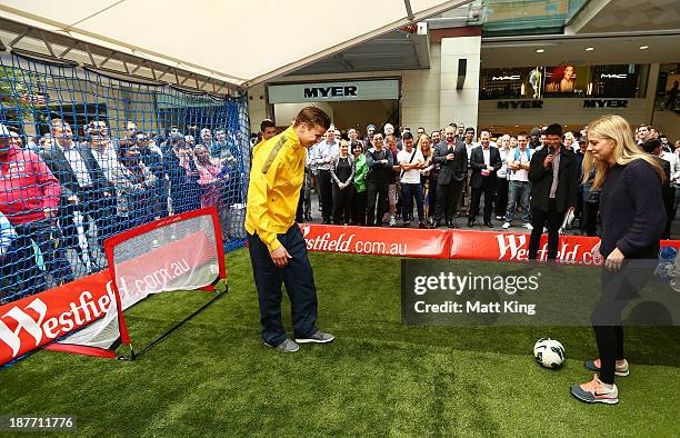 Mitch Langerak takes part in a fan competition during an Australian Socceroos public appearance at Westfield Sydney on November 12, 2013 in Sydney,...