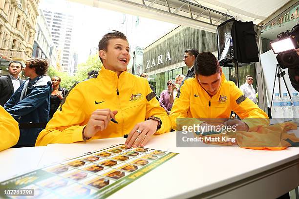 Mitch Langerak signs autographs for fans during an Australian Socceroos public appearance at Westfield Sydney on November 12, 2013 in Sydney,...