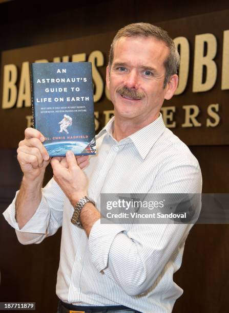 Col. Chris Hadfield signs copies of his new book "An Astronaut's Guide To Life On Earth" at Barnes & Noble bookstore at The Grove on November 11,...