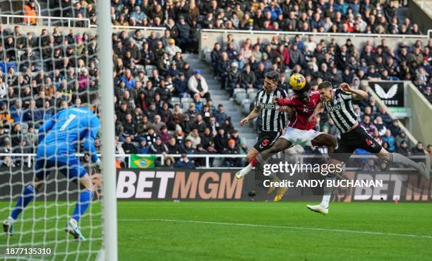 Newcastle United's Swiss defender Fabian Schar, Nottingham Forest's Nigerian defender Ola Aina and Newcastle United's Dutch defender Sven Botman...