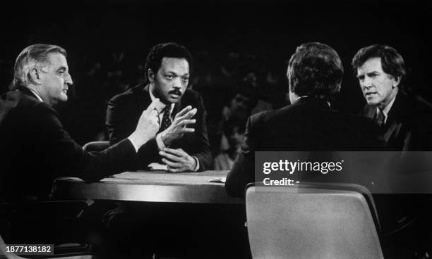 Democratic presidential candidates Walter Mondale and Jesse Jackson participate in the Democratic debate at Columbia University on March 28, 1984 in...