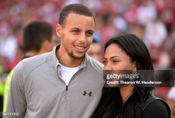 Golden State Warroirs guard Stephen Curry and his wife Ayesha are fans on the sidelines during the Carolina Panthers and San Francisco 49ers NFL Game...
