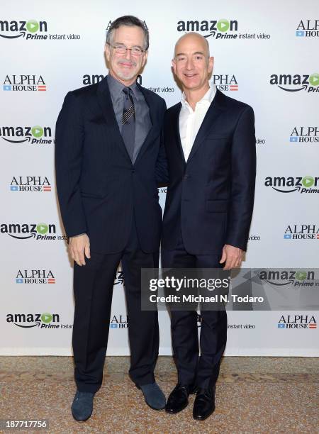 Writer Garry Trudeau and Amazon.com founder and CEO Jeff Bezos attend Amazon Studios Premiere Screening for "Alpha House" on November 11, 2013 in New...