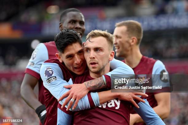 Jarrod Bowen of West Ham United celebrates with teammate Edson Alvarez after scoring their team's first goal during the Premier League match between...