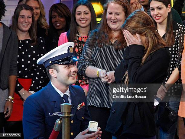 Samuel Peikert of the US Coast Guard proposes live with the help of Jason Derulo on "Good Morning America," 11/11/13, airing on the Walt Disney...