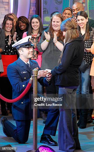 Samuel Peikert of the US Coast Guard proposes live with the help of Jason Derulo on "Good Morning America," 11/11/13, airing on the Walt Disney...