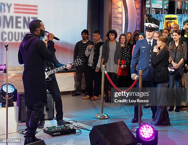 Samuel Peikert of the US Coast Guard proposes live with the help of Jason Derulo on "Good Morning America," 11/11/13, airing on the Walt Disney...