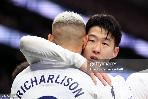 Richarlison of Tottenham Hotspur celebrates with Son Heung-Min of Tottenham Hotspur after scoring their team's first goal during the Premier League...