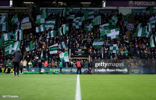 General view of the inside of the stadium as fans of Plymouth Argyle raise flags as they penjoy the pre-match atmosphereprior to the Sky Bet...