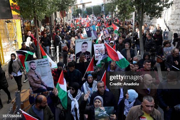 Hundreds of Palestinians holding banners and Palestinian flags, gather at Al-Manara Square protesting Israeli attacks on Gaza and show their support...