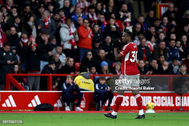 Willy Boly of Nottingham Forest reacts whilst leaving the field after being shown a red card, following a second yellow card, by Match Referee Robert...