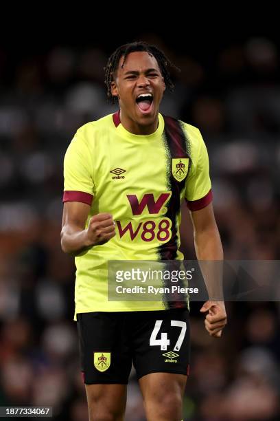 Wilson Odobert of Burnley celebrates after scoring their team's first goal during the Premier League match between Fulham FC and Burnley FC at Craven...