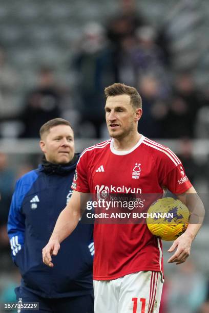Nottingham Forest's New Zealand striker Chris Wood reacts at the end of the English Premier League football match between Newcastle United and...