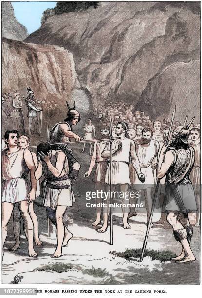 old engraved illustration of the romans passing under the yoke at the caudine forks - military invasion stock pictures, royalty-free photos & images