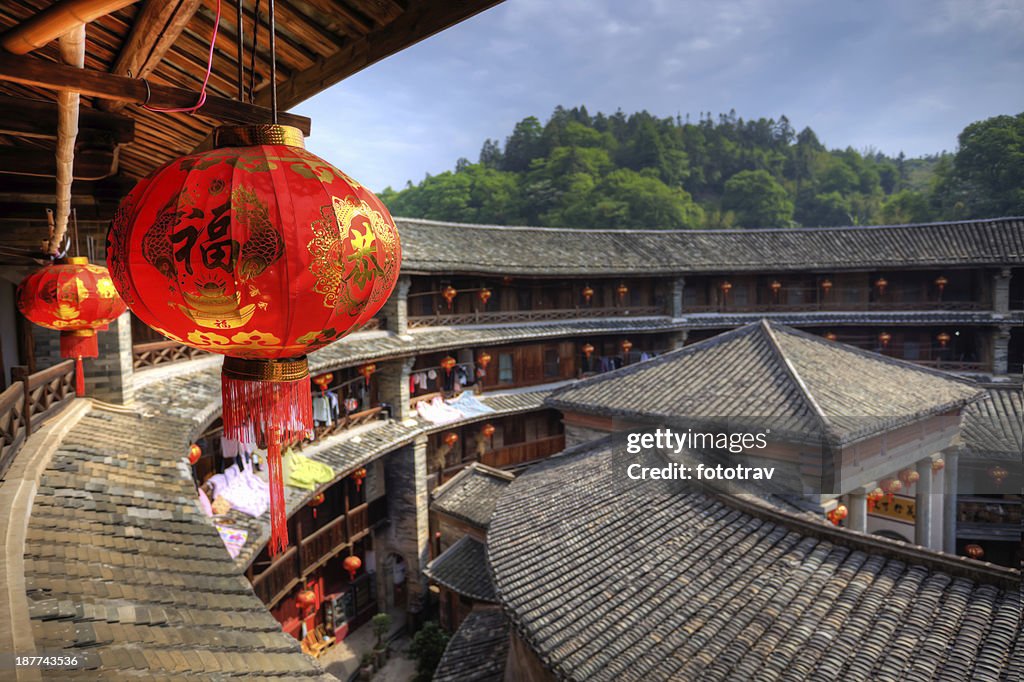 Red Chinese lantern in a Hakka Tulou traditional housing, Fujian