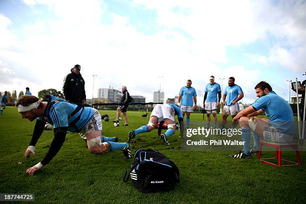 Wyatt Crockett of the All Blacks practices his scrum technique during a New Zealand All Blacks training session at Latymers Upper School on November...