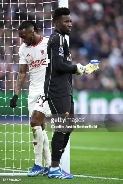 Andre Onana of Manchester United puts vaseline on his gloves during the Premier League match between West Ham United and Manchester United at London...