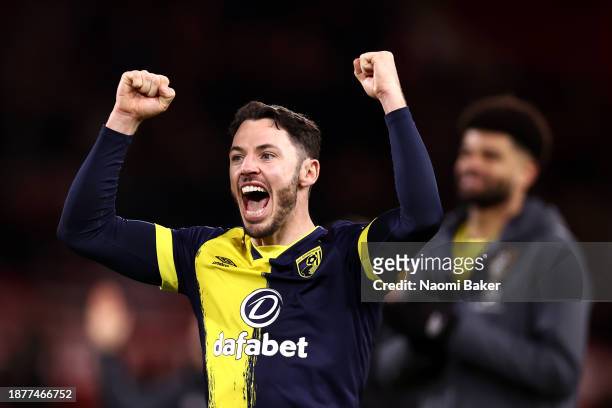 Adam Smith of AFC Bournemouth celebrates after the team's victory in the Premier League match between Nottingham Forest and AFC Bournemouth at City...